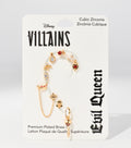 Gold-tone earring set with red and clear crystals, a mirror, crown charms and a chain, displayed on a white Disney Villains Evil Queen card.