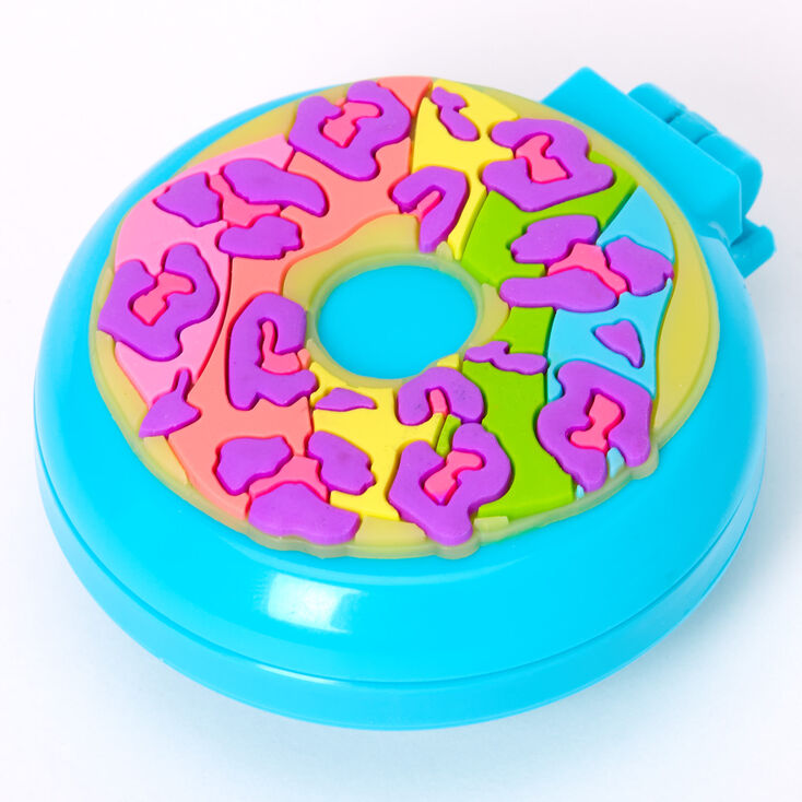 Claire's Brosse à cheveux rétractable donut arc-en-ciel - Bleu