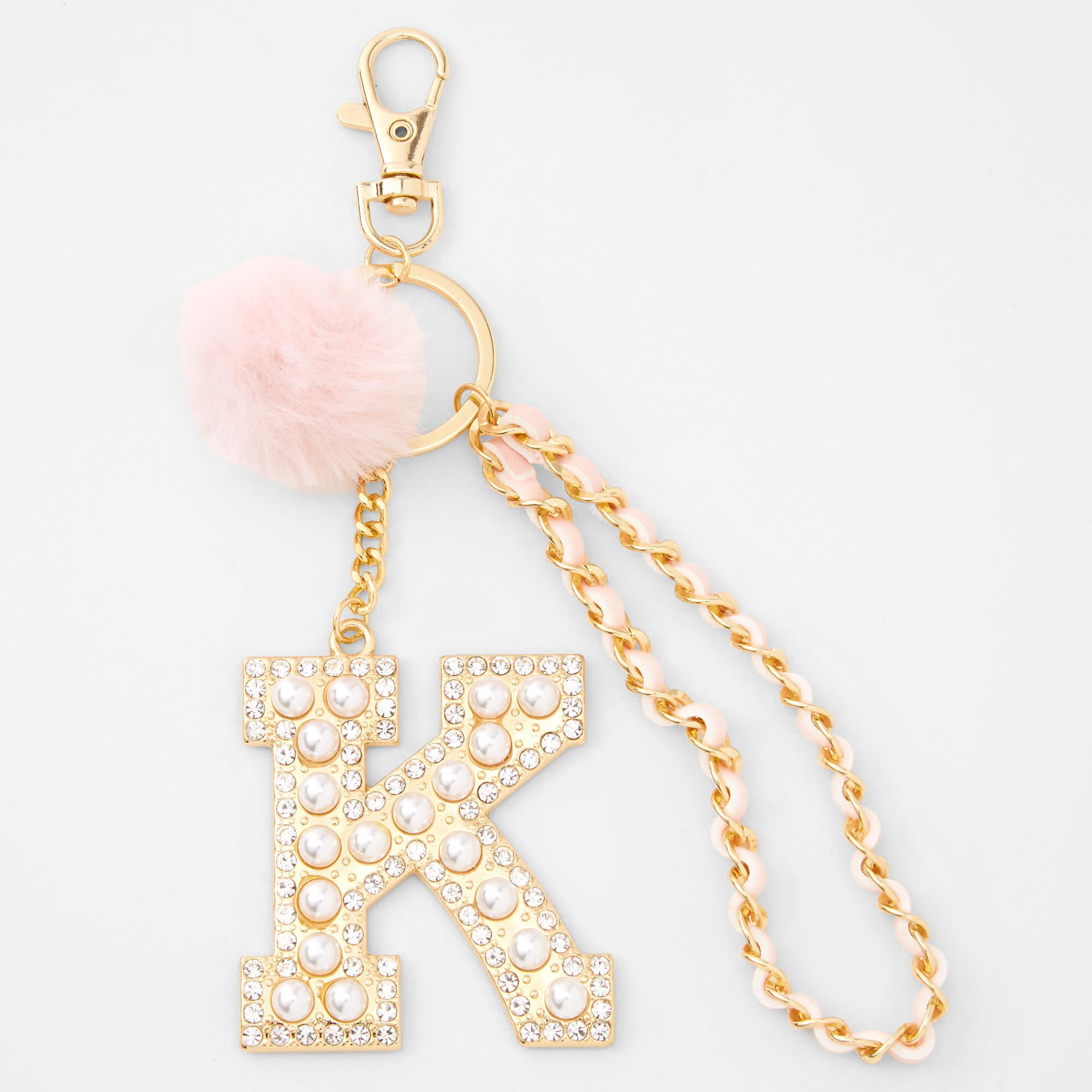 Claire's Porte-clés pompon à initiale bling-bling couleur dorée - Rose, K