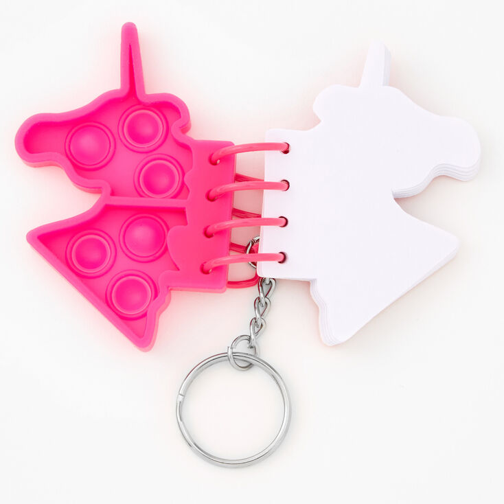 Porte-cl&eacute;s jouet fidget avec mini journal licorne rose,