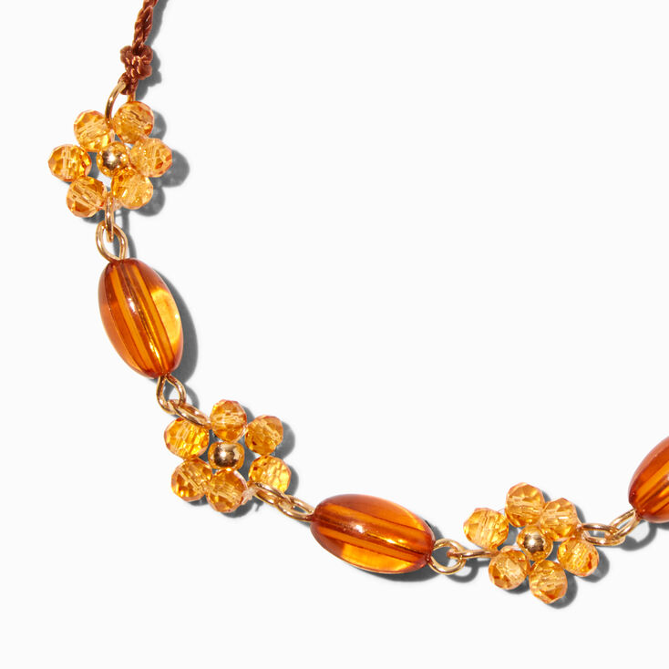 Bracelet bolo floral perl&eacute; orange,