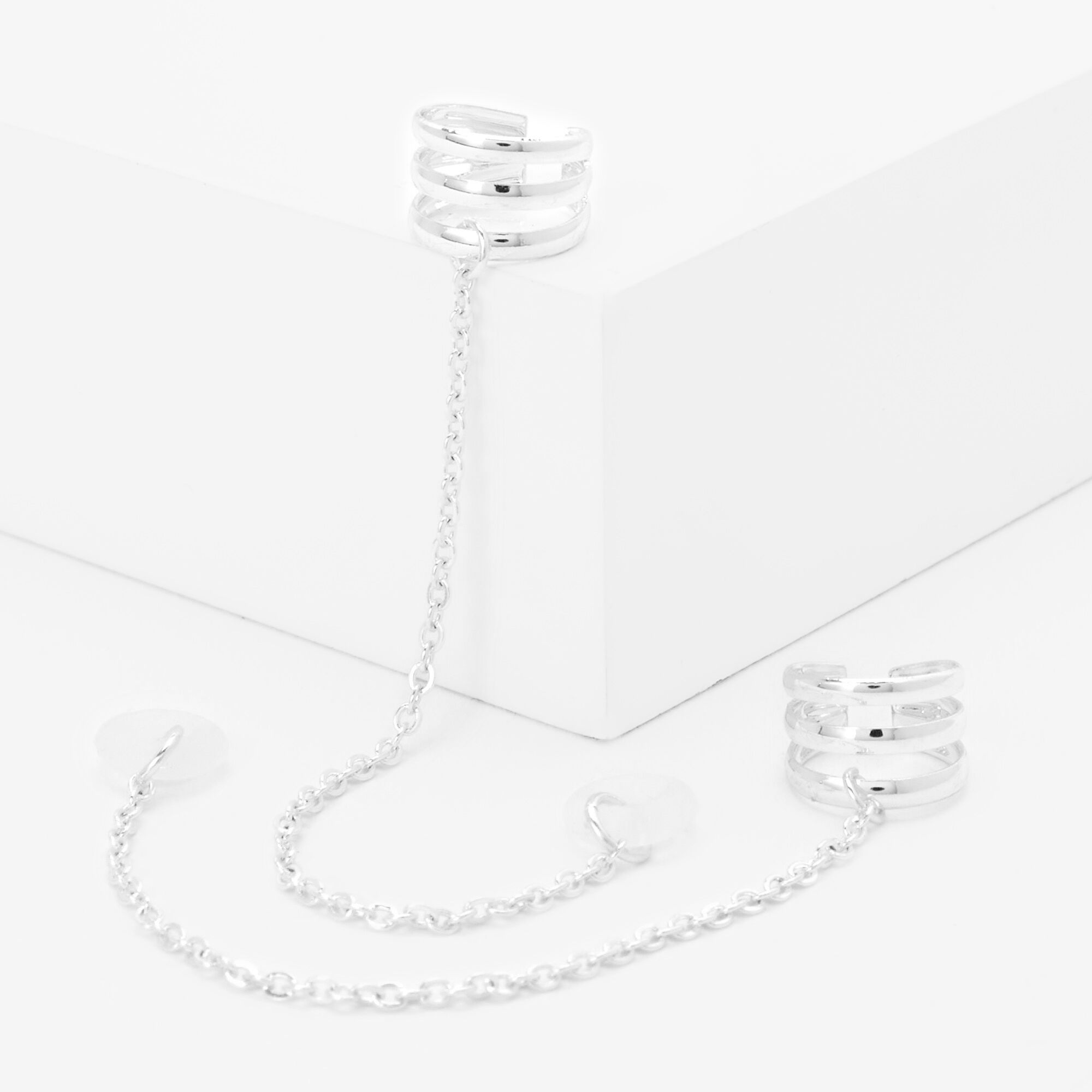 Claire's Manchettes d’oreilles triple rang couleur argentée - Compatible avec les AirPods® de Apple