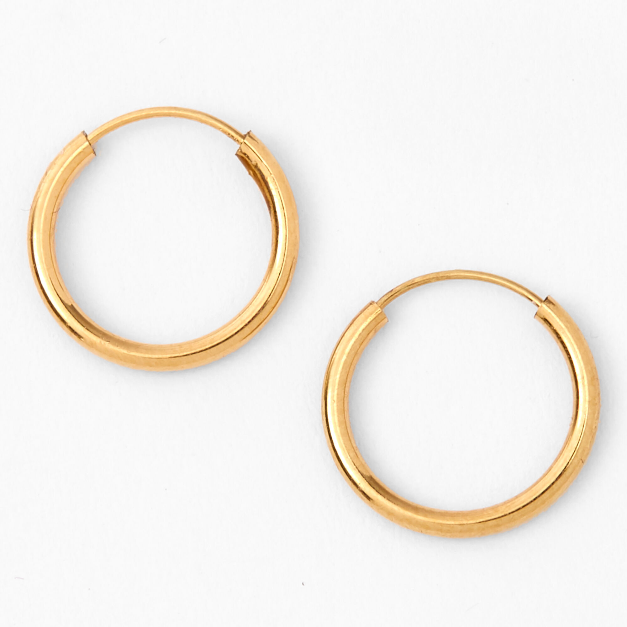 View Claires 18Ct Plated 12MM Hoop Earrings Gold information