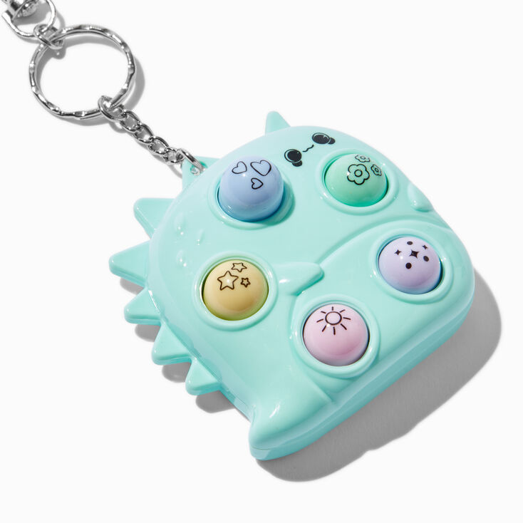 Porte-cl&eacute;s dinosaure jeu de la taupe,