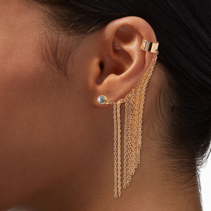 Boucle et manchette d&rsquo;oreille reli&eacute;es par une frange couleur dor&eacute;e,