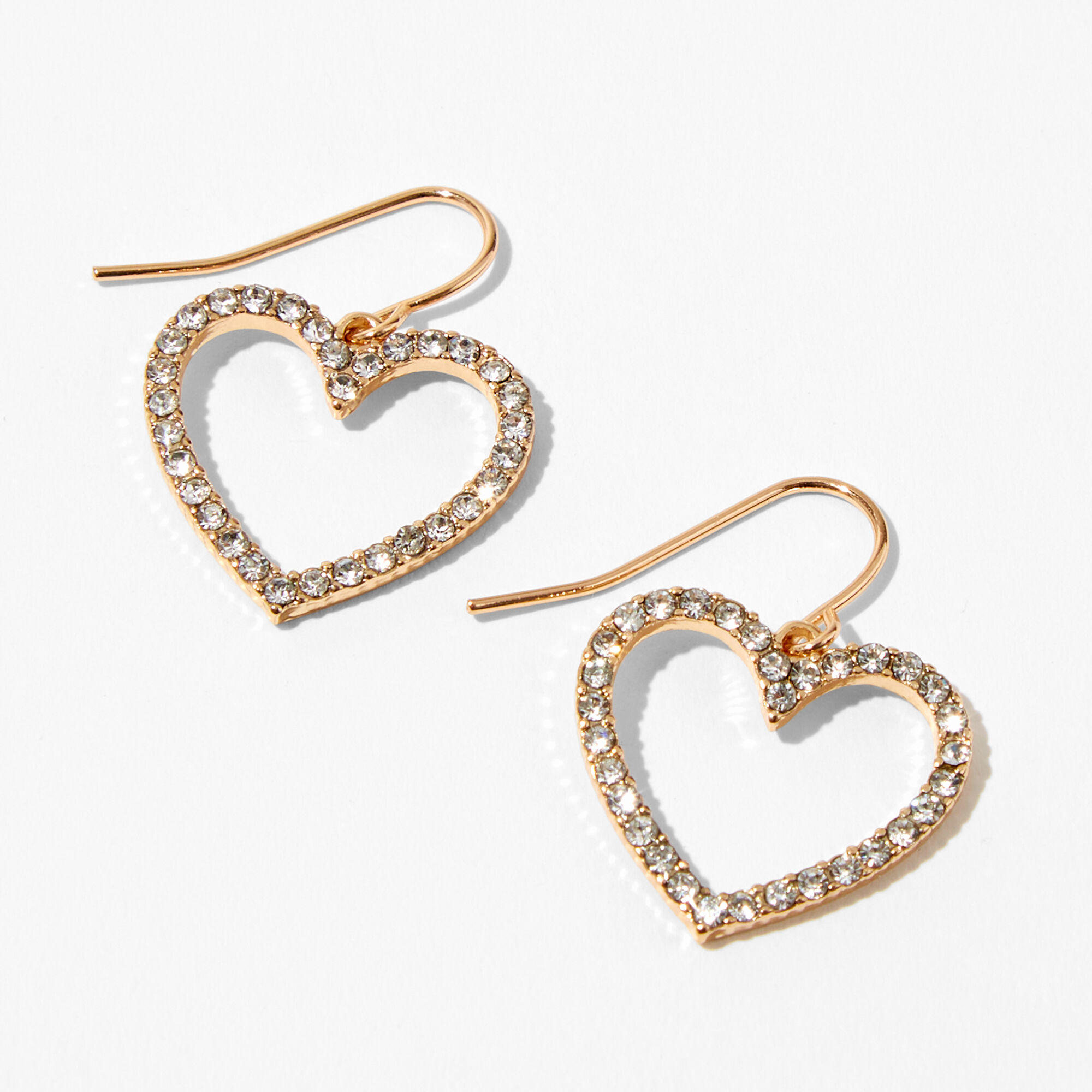 View Claires Tone 15 Embellished Crystal Heart Drop Earrings Gold information