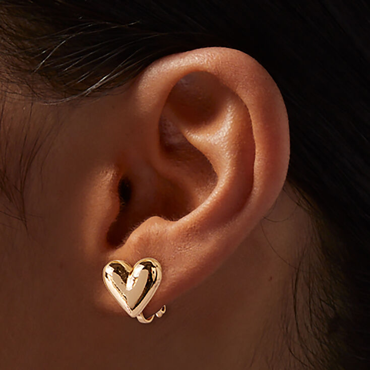 Clous d&#39;oreilles &agrave; clip c&oelig;ur bomb&eacute; couleur dor&eacute;e,