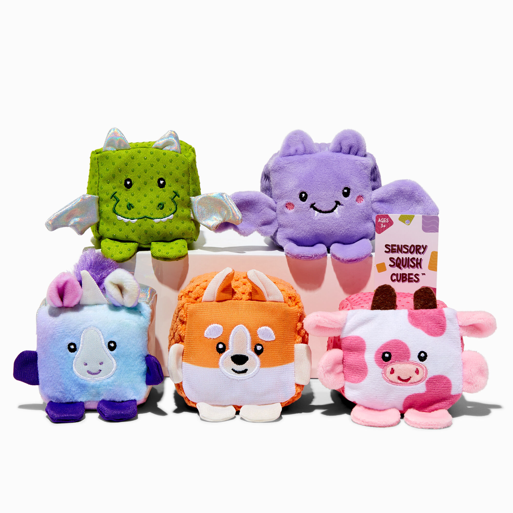 View Claires Sensory Squish Cubes 4 Plush Toy Styles May Vary information