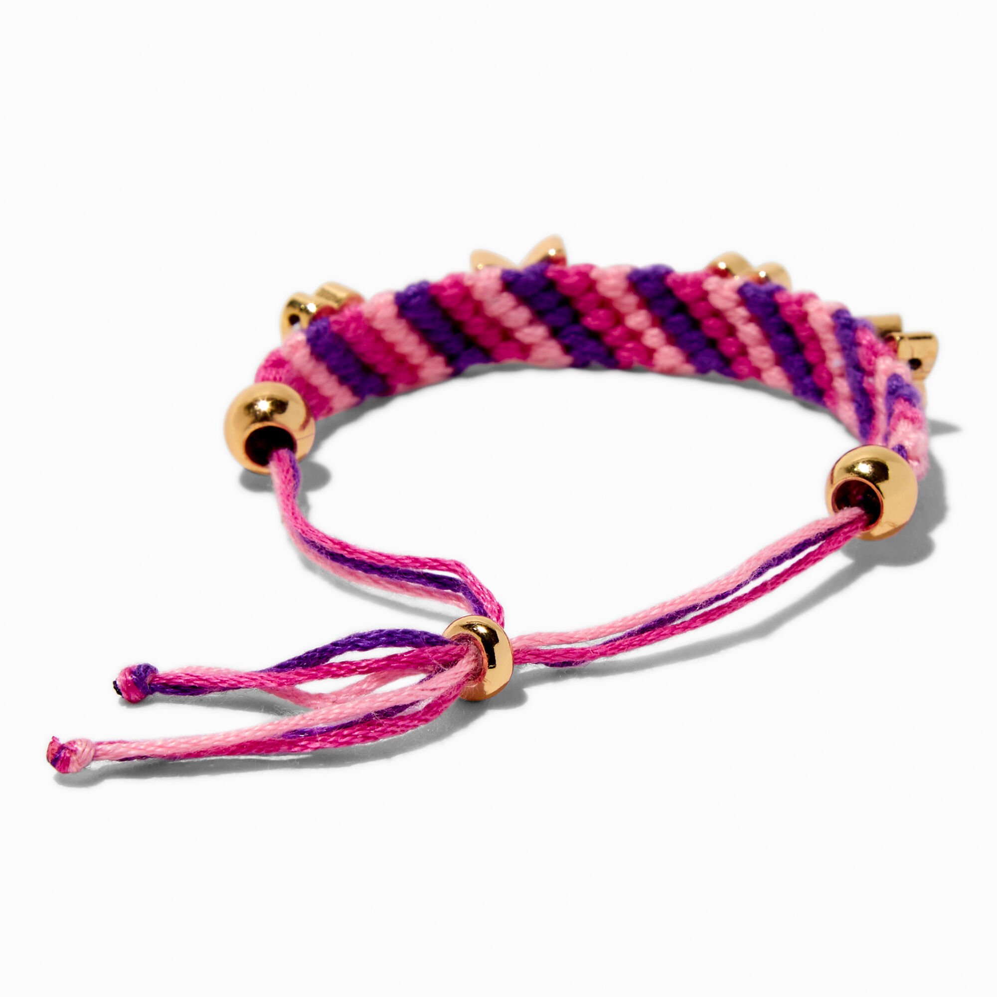 Bracelet bolo tressé rose et violet breloques couleur dorée,