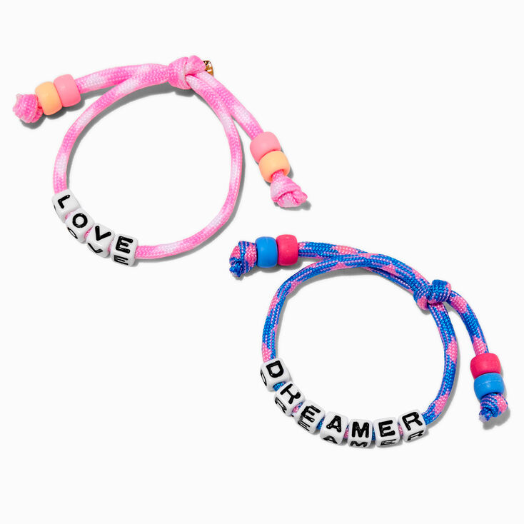 T H E M E x Claire&#39;s &#39;&#39;Love&#39;&#39; &amp; &#39;&#39;Dreamer&#39;&#39; Glow in the Dark Adjustable Bracelets - 2 Pack,