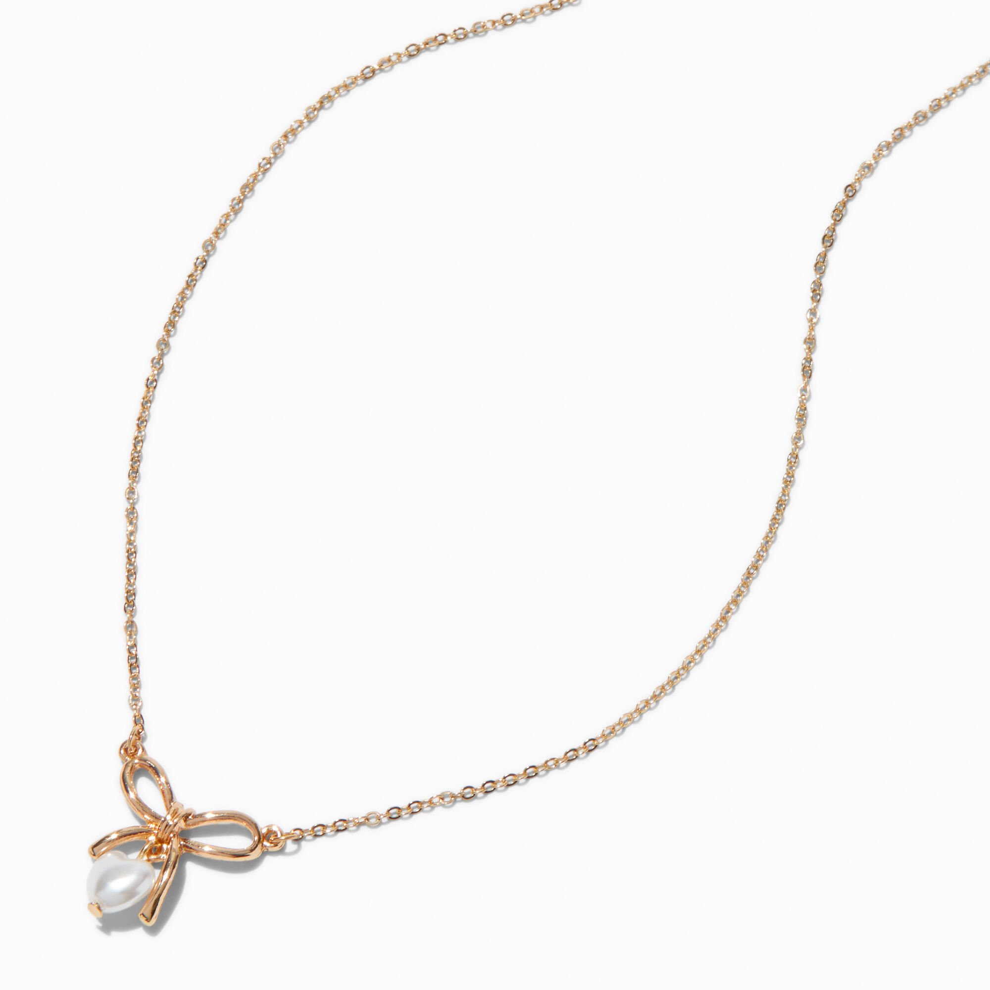 View Claires Tone Bow Heart Pearl Pendant Necklace Gold information