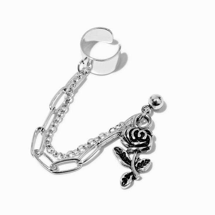 Boucles d&#39;oreilles reli&eacute;es par une cha&icirc;ne rose couleur argent&eacute;e,