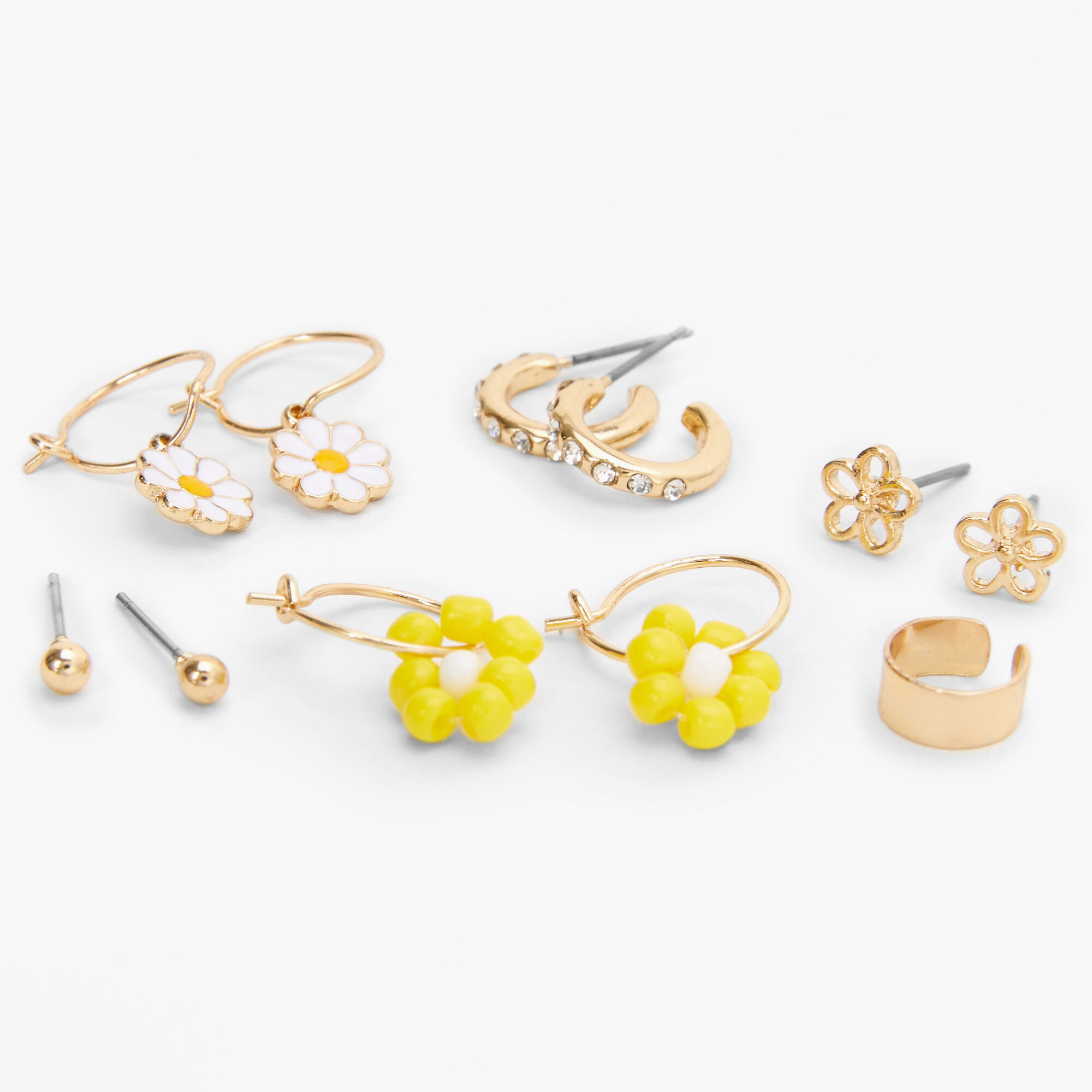 Claire's Lot de boucles d'oreilles et manchettes marguerite aux designs variés sur le thème du printemps - Lot de 6