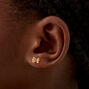 Mini clous d&#39;oreilles &agrave; n&oelig;ud couleur dor&eacute;e,