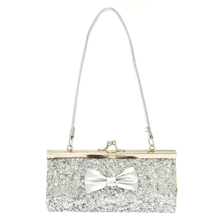 Sac pochette &agrave; n&oelig;ud paillet&eacute; couleur argent&eacute; du Claire&#39;s&nbsp;Club,
