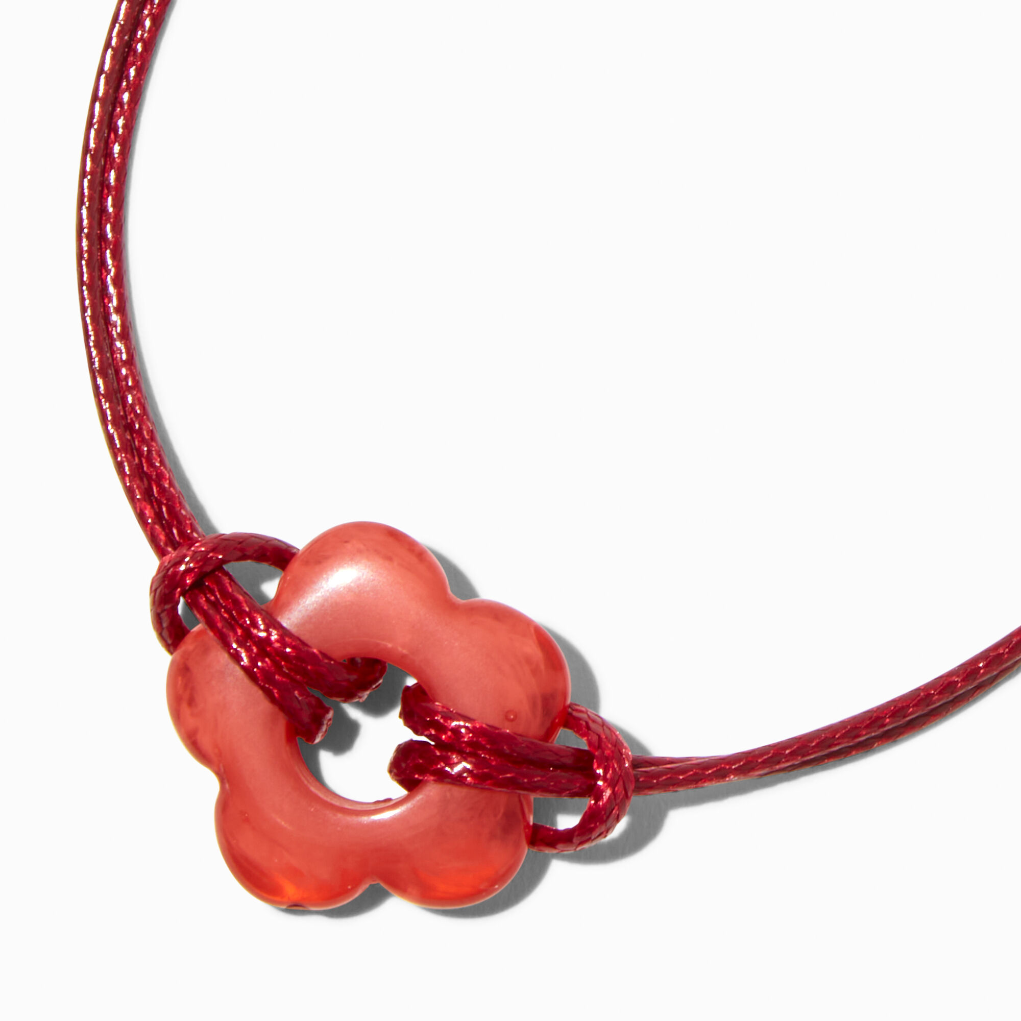 Bracelet cordelette avec marguerite orange ajourée,