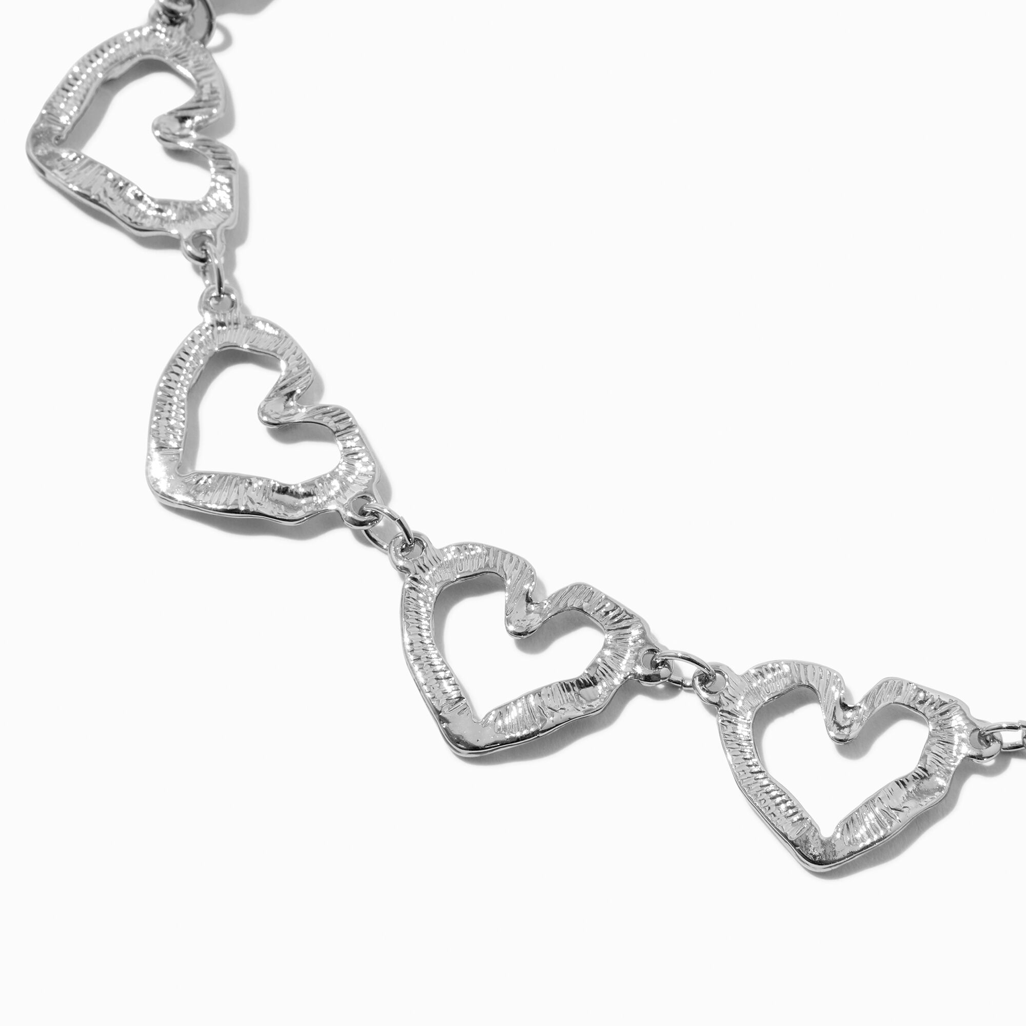View Claires Tone Textured Heart Chain Necklace Silver information