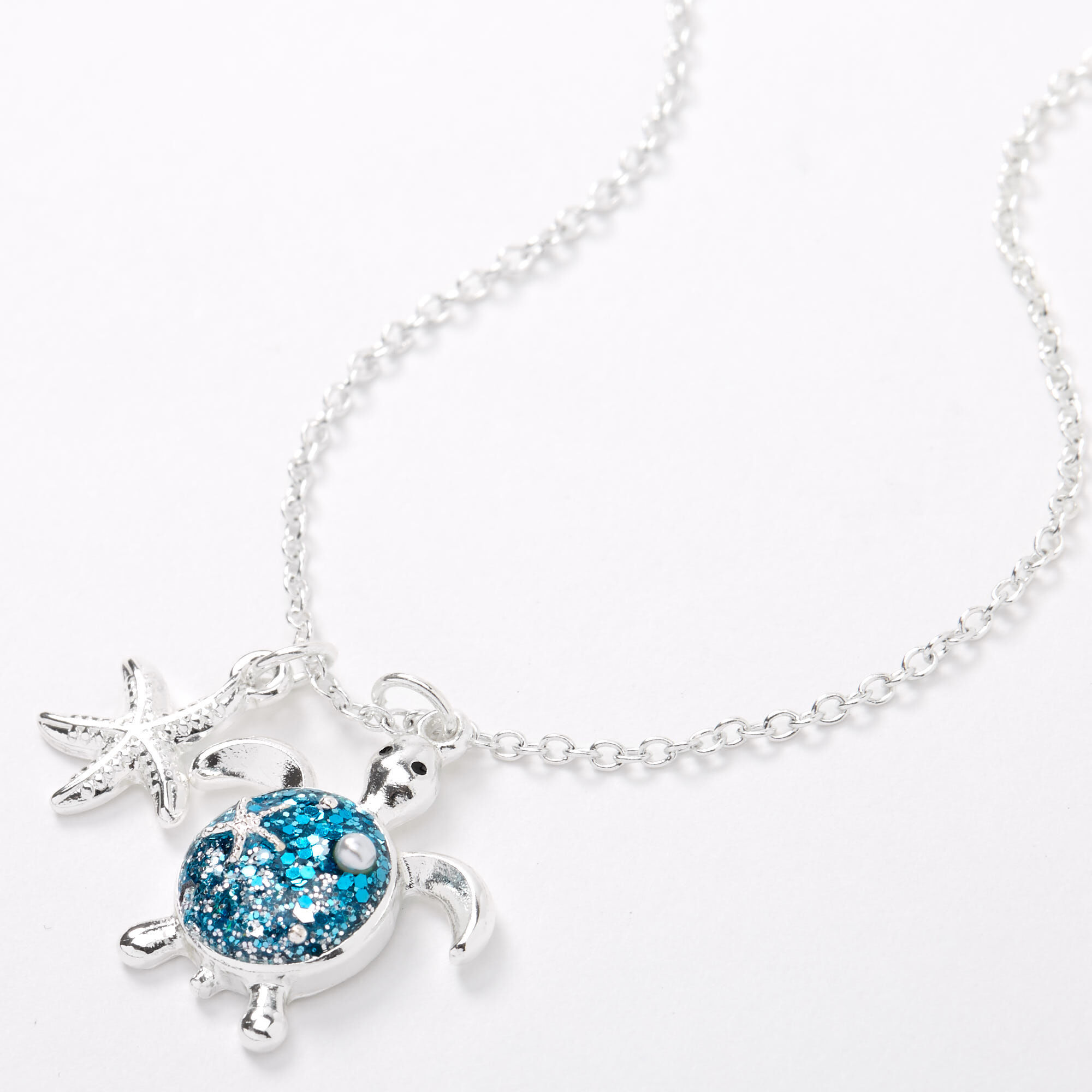 View Claires SilverTone Glitter Turtle Pendant Necklace Turquoise information