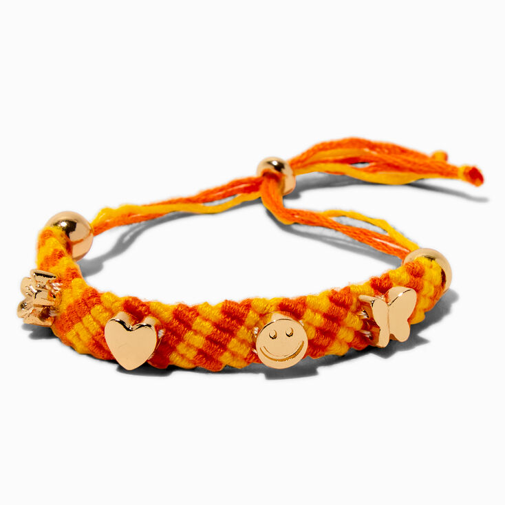 Bracelet bolo tress&eacute; jaune et orange breloque couleur dor&eacute;e,