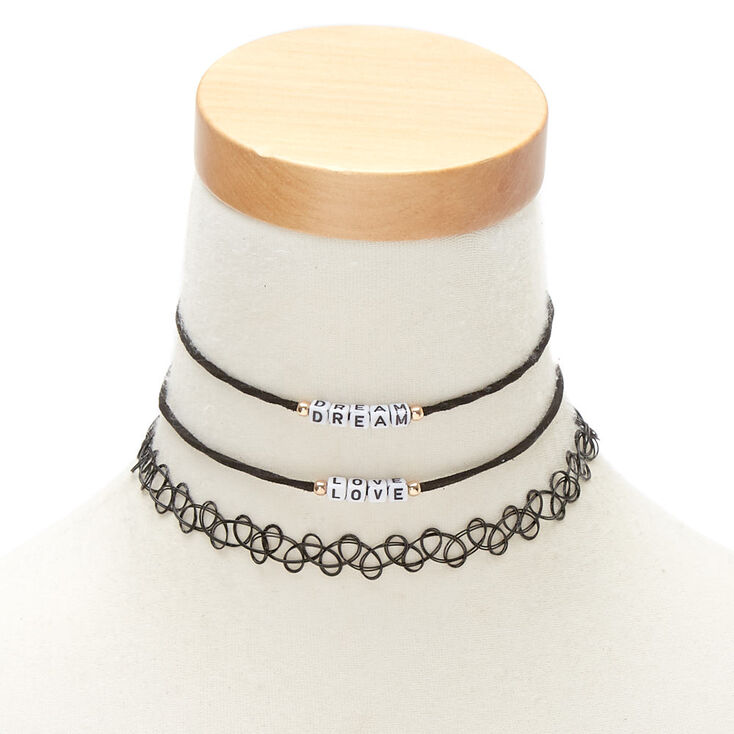 Claire's Ras-de-cou noirs « Dream » et « Love »