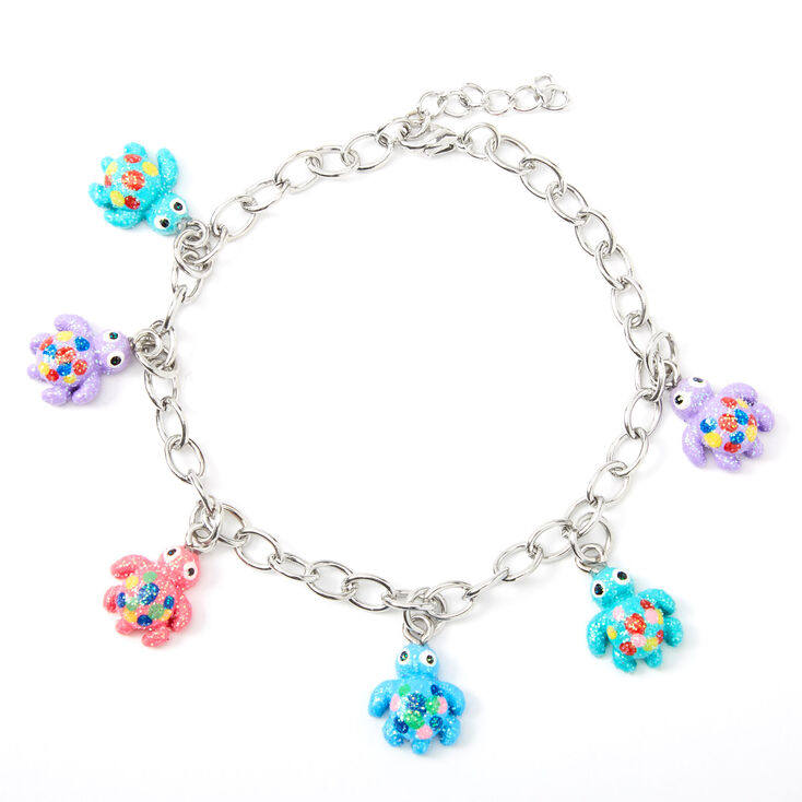 Claire's Bracelet à breloques tortues pailletées couleur argentée