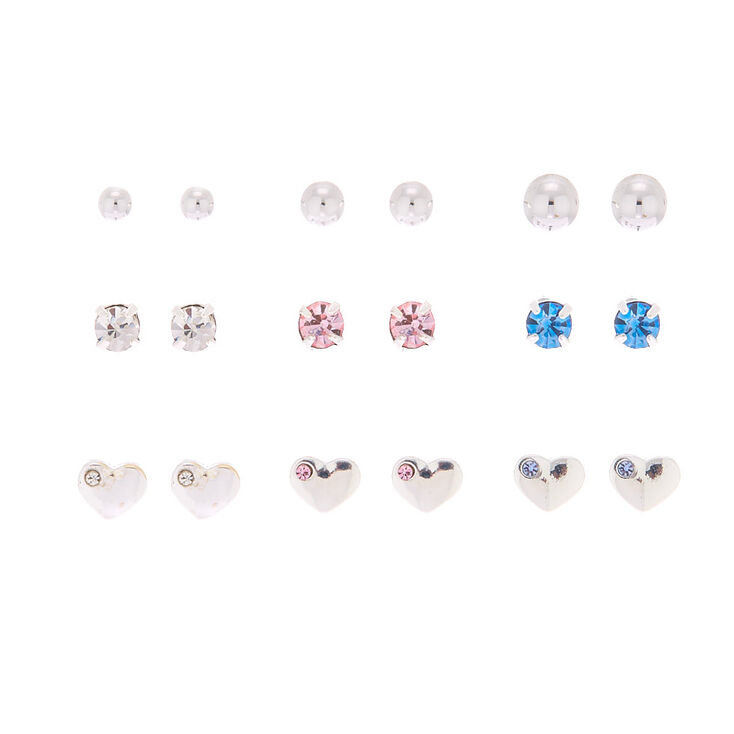 Claire's Lot de 9 paires de clous d’oreille cœur couleur argenté