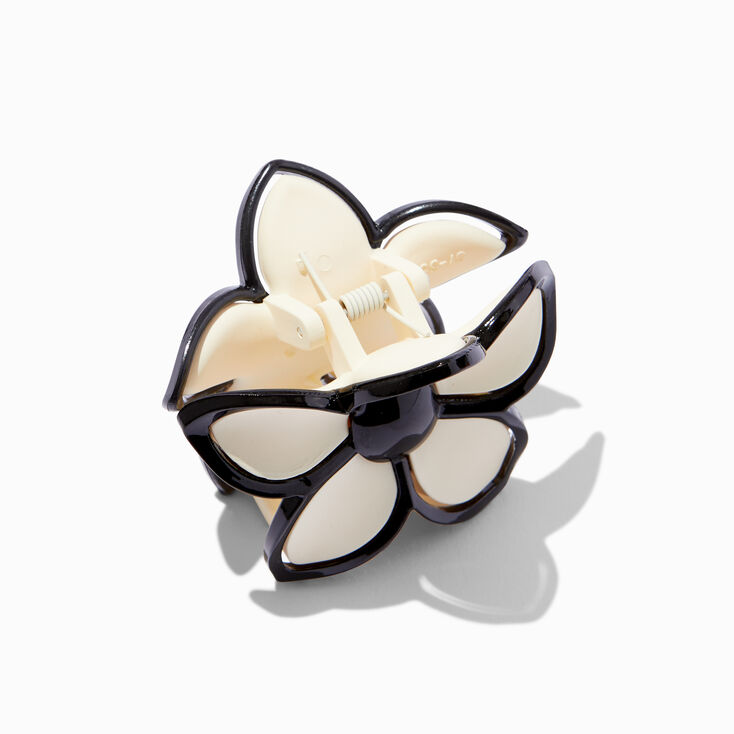 Pince &agrave; cheveux fleurs bord&eacute;e cr&egrave;me et noire,