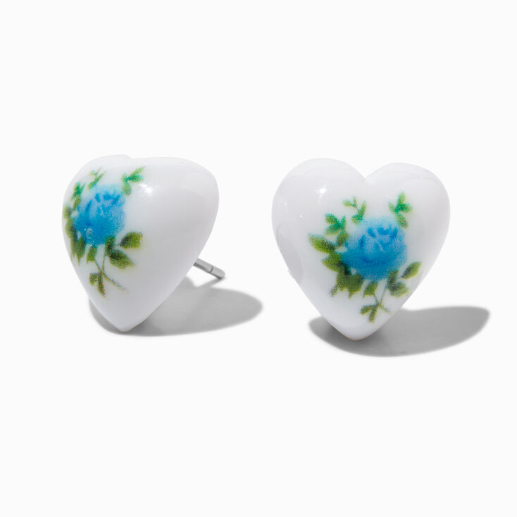 Clous d&#39;oreilles c&oelig;ur blanc et fleur bleue,