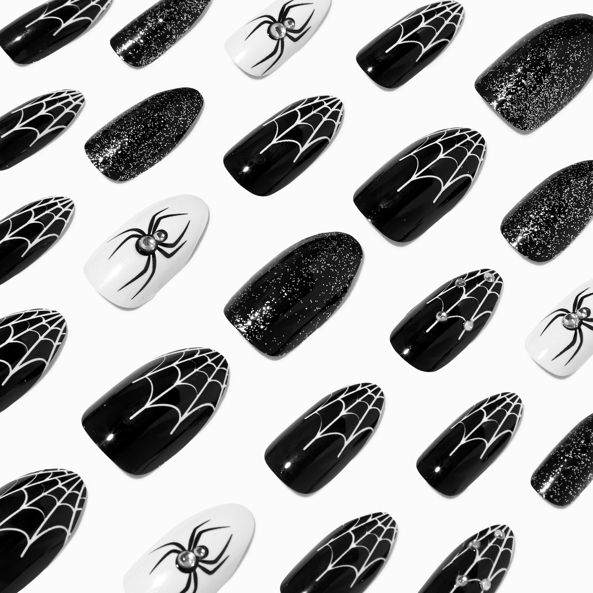 View Claires Spiders Webs Glow In The Dark Press On Faux Nail Set 24 Pack information