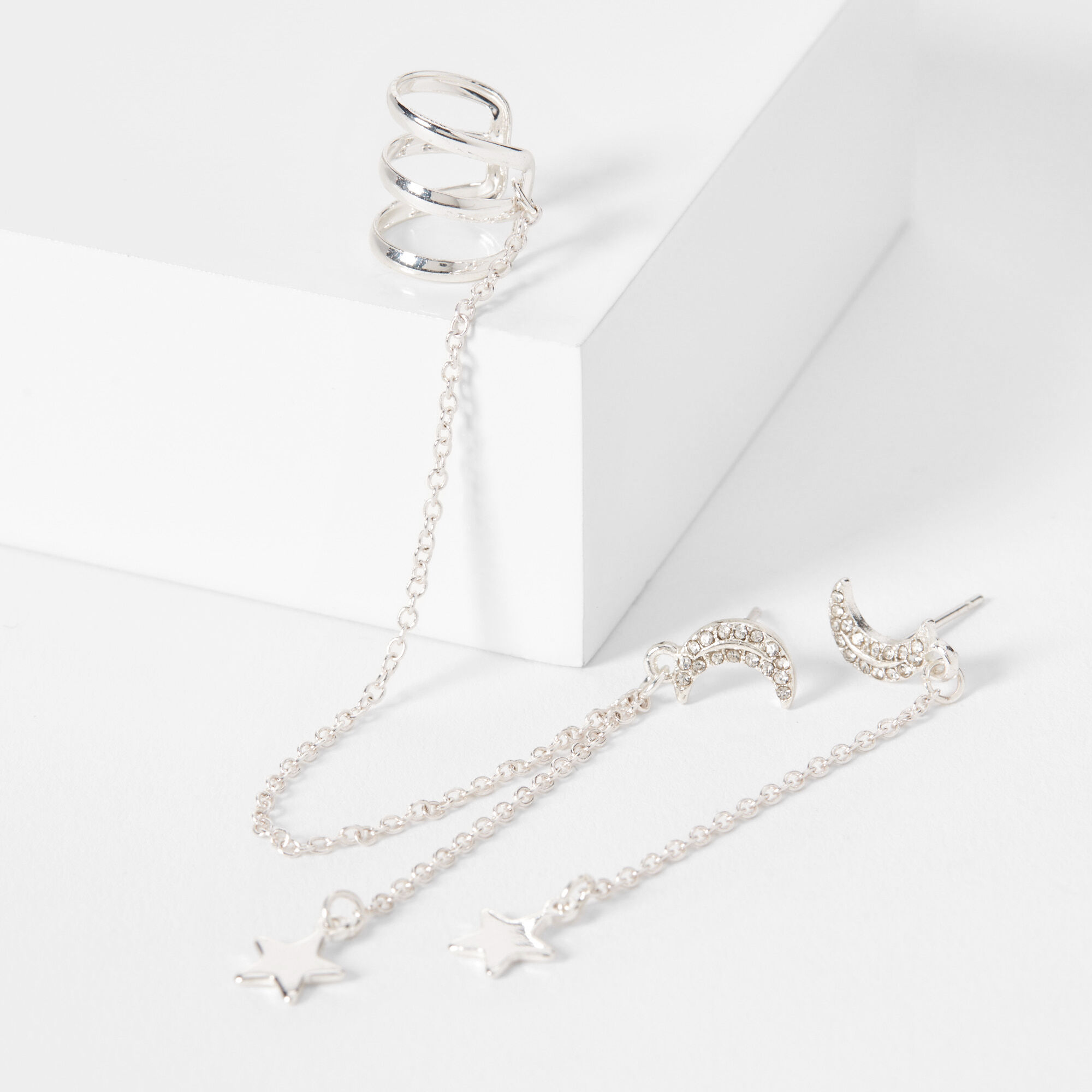 Claire's Manchette d'oreille et clous d’oreilles linéaires décorés motif étoile couleur argentée - Lot de 3
