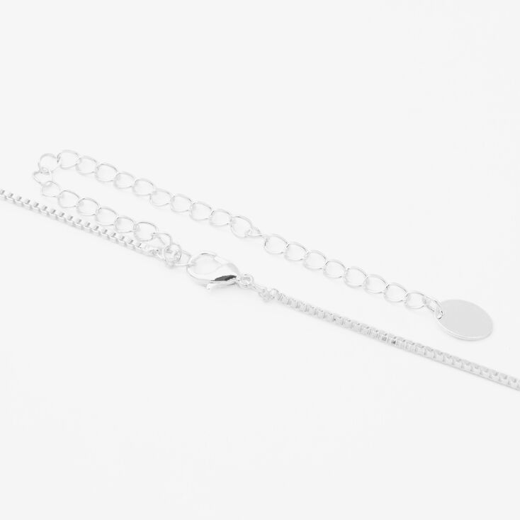 Collier &agrave; pendentif croix couleur argent&eacute;e,