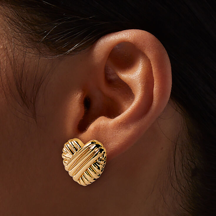 Clous d&#39;oreilles c&oelig;ur bomb&eacute;s couleur dor&eacute;e,