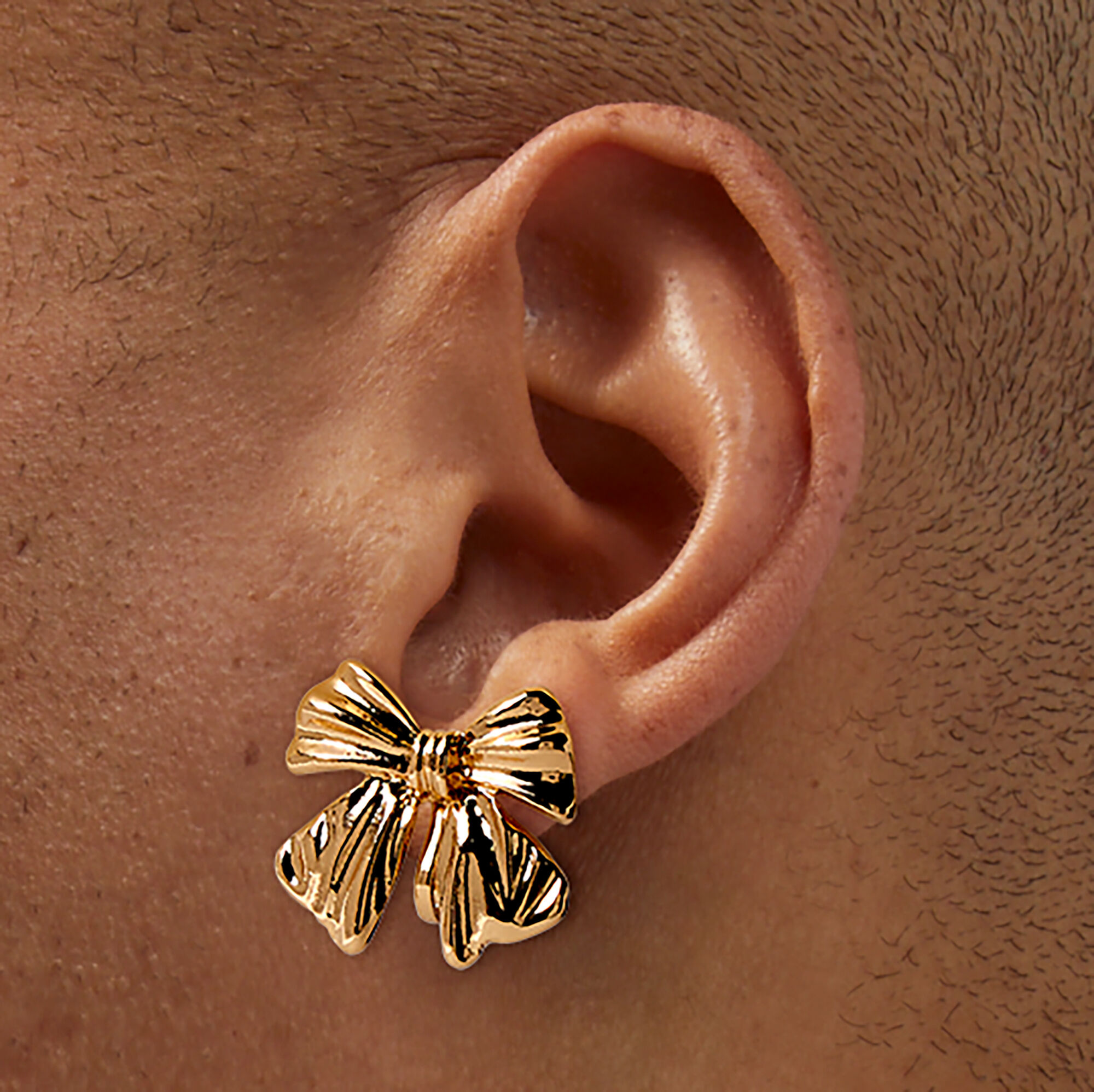 Gold-tone Bow Clip-On Earrings | Claire's US