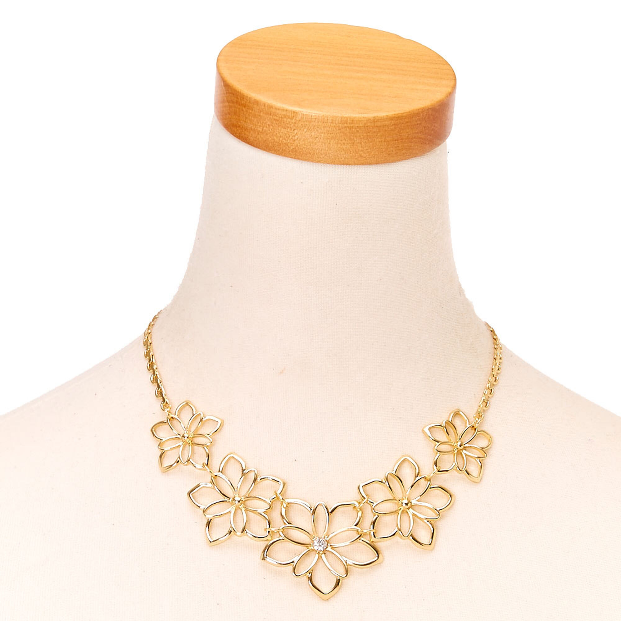 Gold Flower Statement Necklace Claire S Gold Flower Statement Necklace