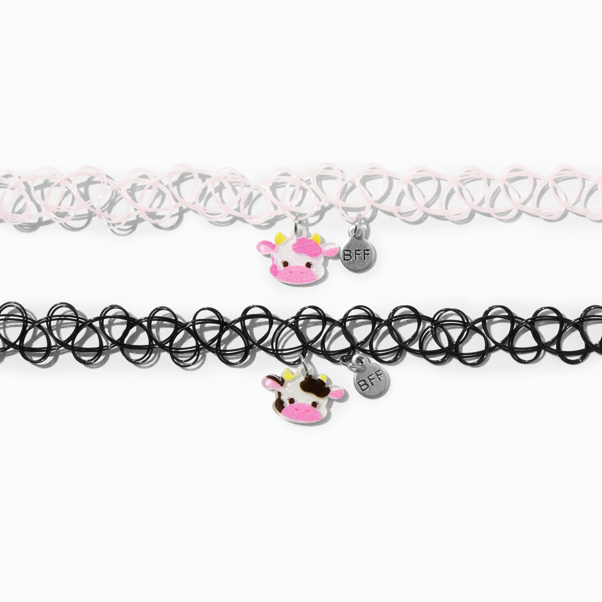 View Claires Best Friends Charming Cow Tattoo Choker Necklaces 2 Pack White information