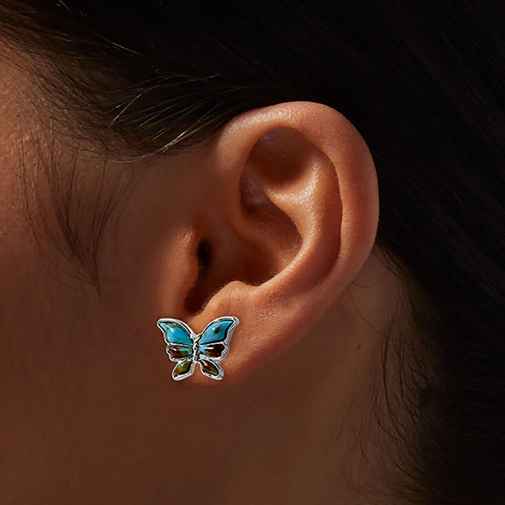 Clous d&#39;oreilles papillon cowgirl couleur argent&eacute;e,