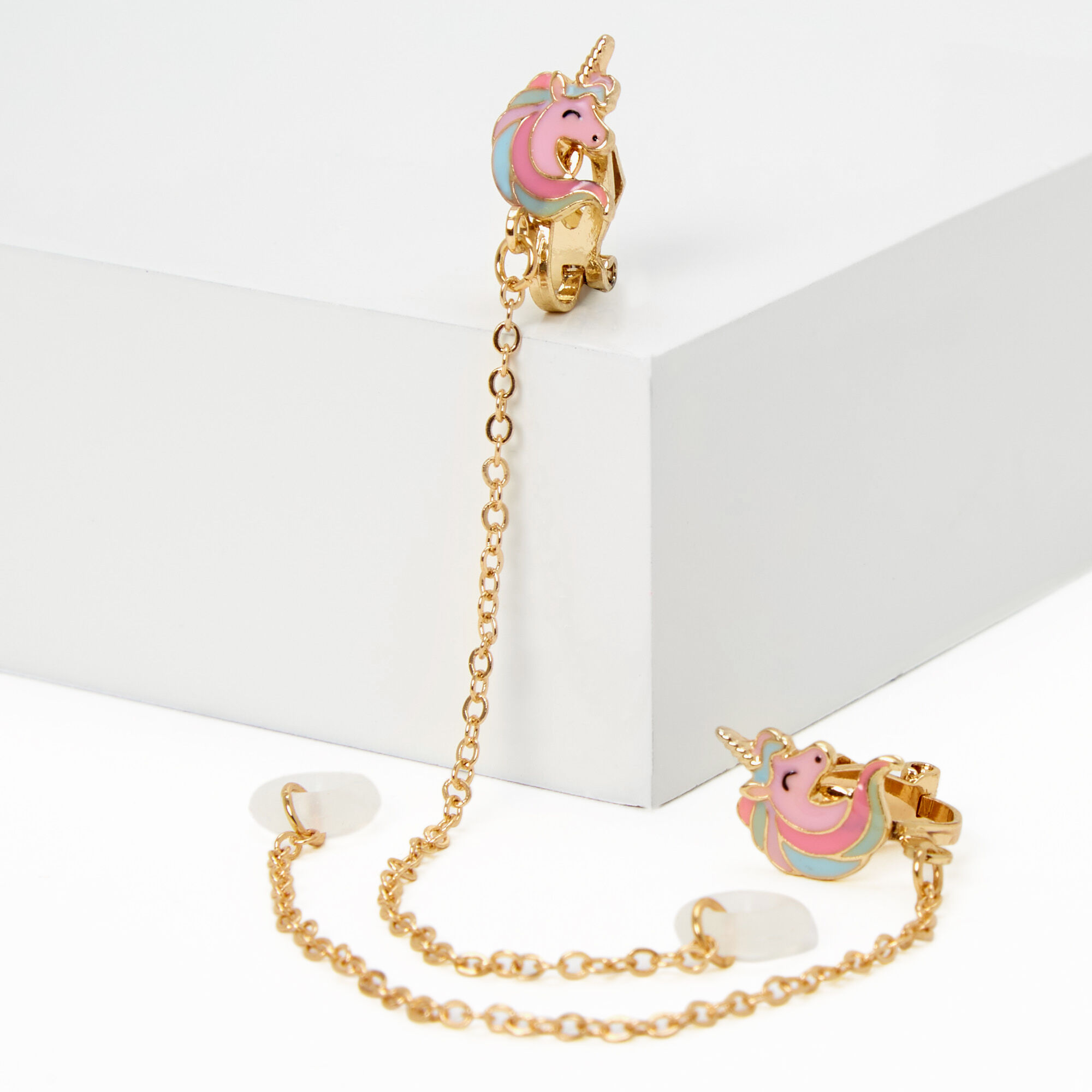 Claire's Manchettes d’oreilles breloque licorne couleur dorée - Compatible avec les AirPods® de Apple