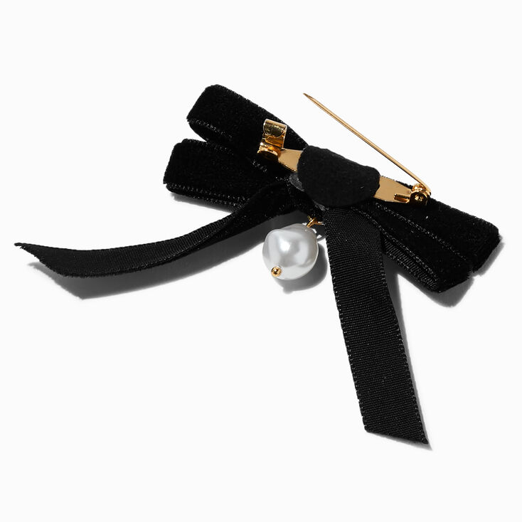Broche perle d&#39;imitation et n&oelig;ud en velours noir,