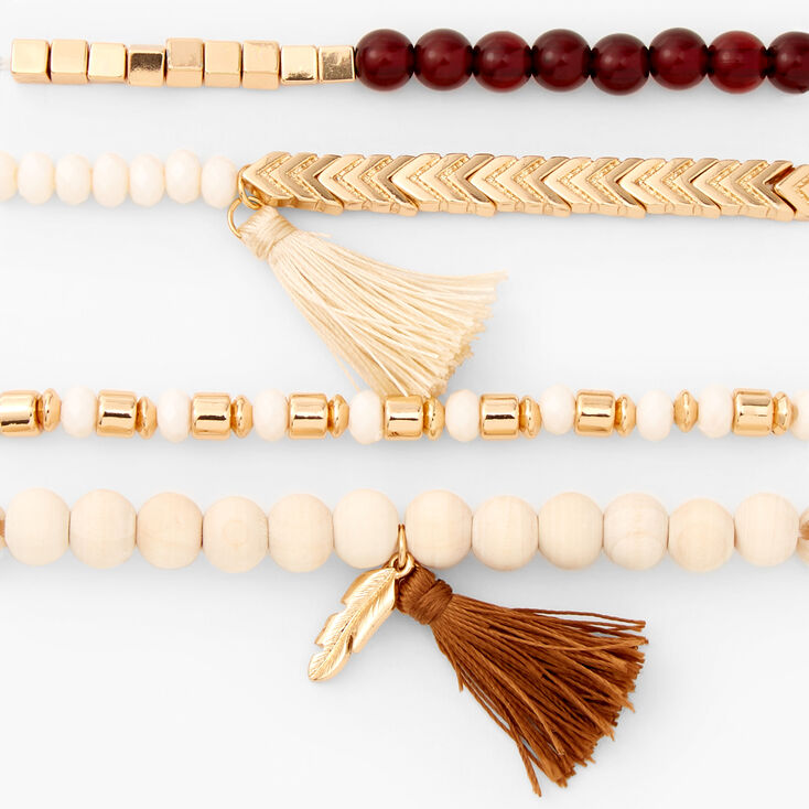 Bracelets &eacute;lastiques perl&eacute;s pompon marron et ivoire - Lot de 4,