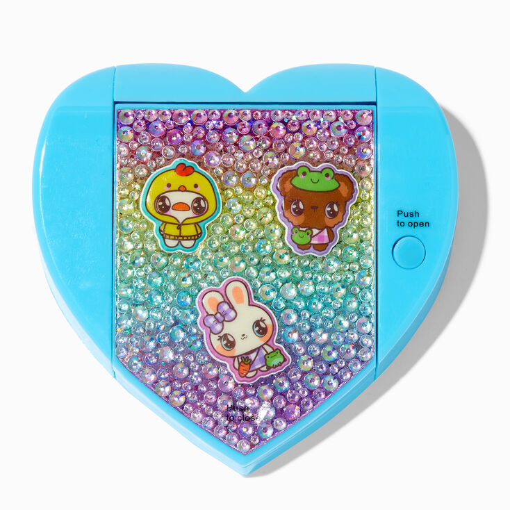 Palette de gloss bling bling &agrave; ouverture m&eacute;canique d&eacute;fil&eacute; de cr&eacute;atures Claire&#39;s&nbsp;Club,