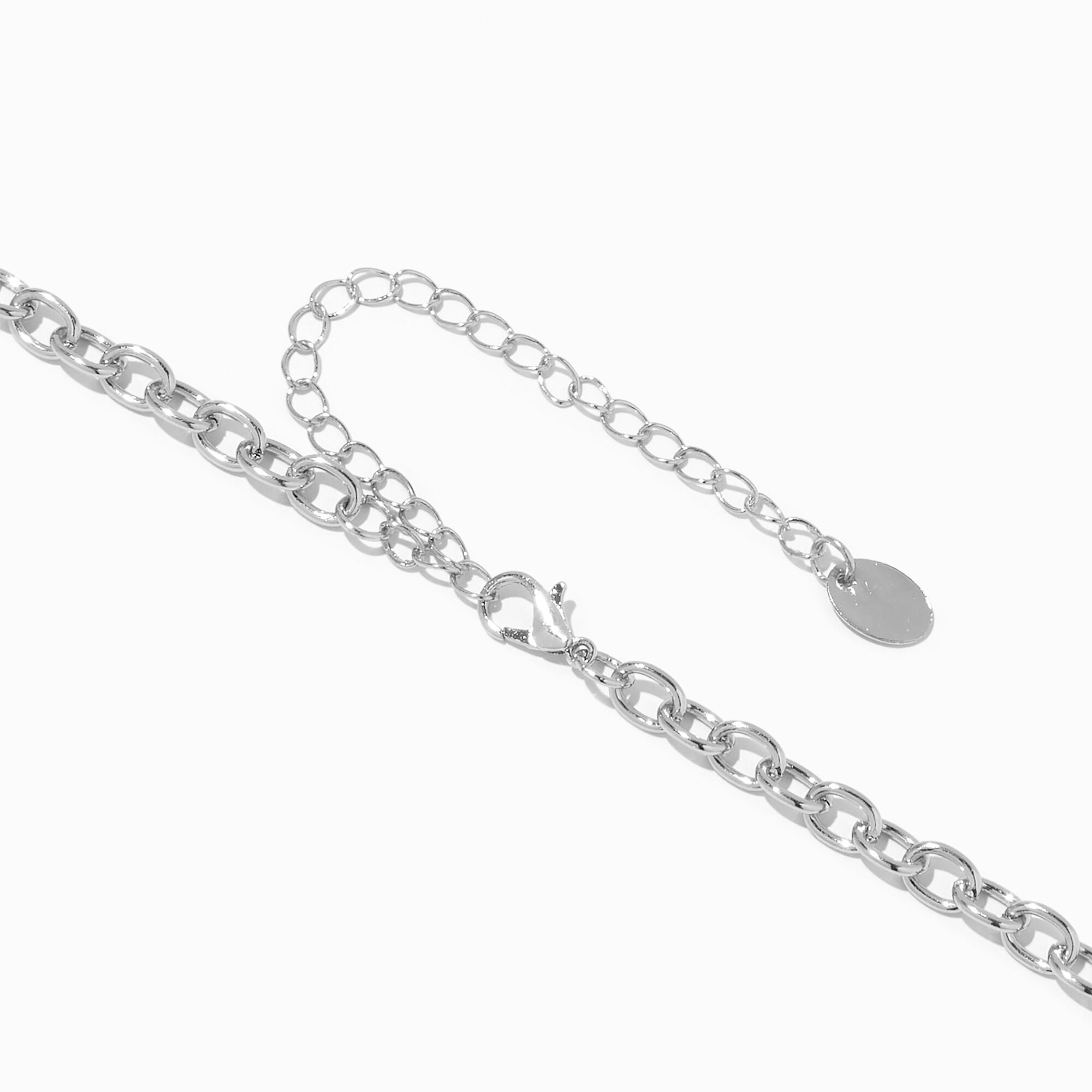 Collier croix en strass couleur argentée,