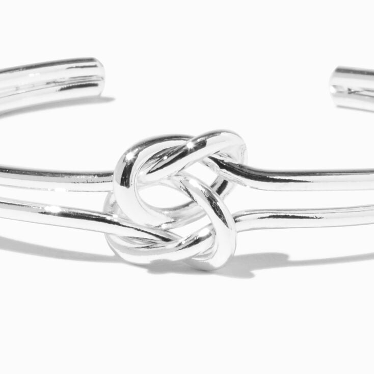Bracelet manchette &agrave; double n&oelig;ud couleur argent&eacute;e,