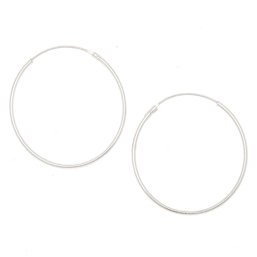 Infinity shop huggie earrings