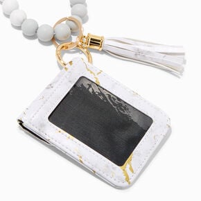 Bracelet perl&eacute; blanc et couleur dor&eacute;e avec mini porte-monnaie &agrave; pression effet marbr&eacute;,