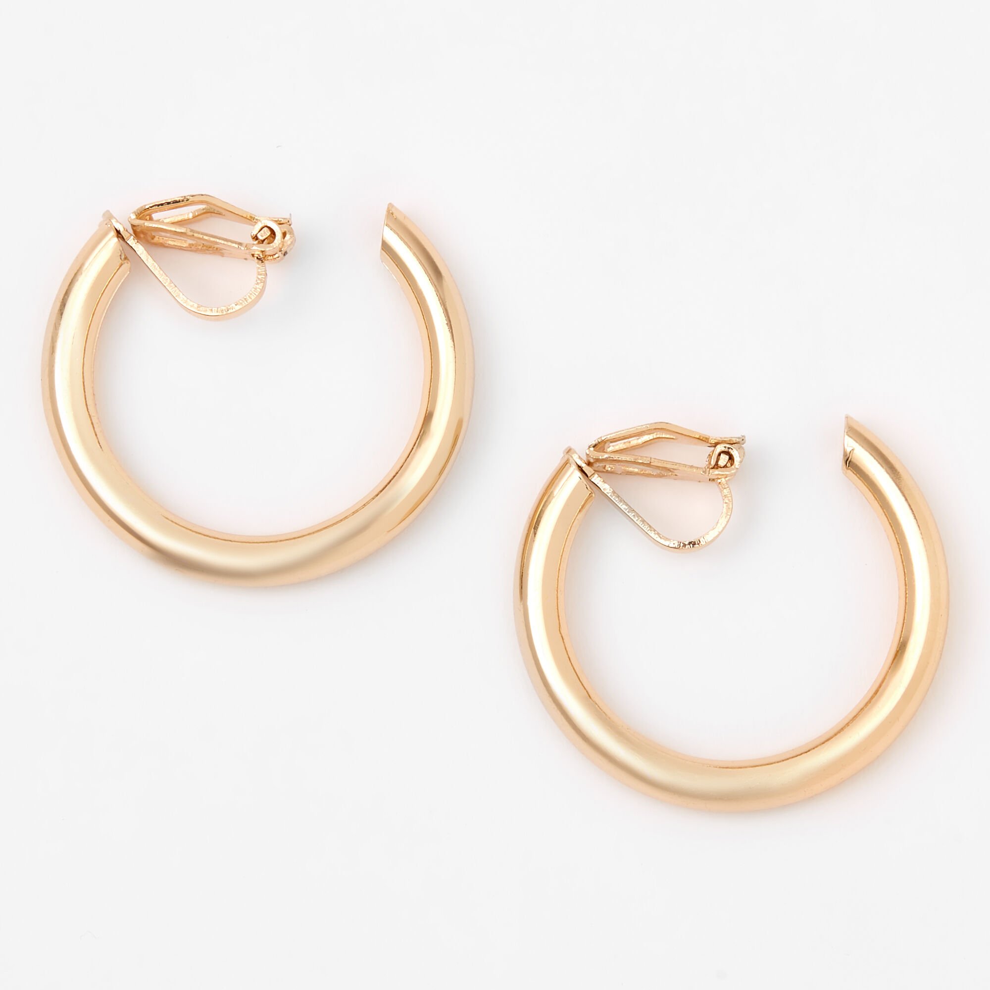 View Claires Tone 30MM Tube Clip On Hoop Earrings Gold information