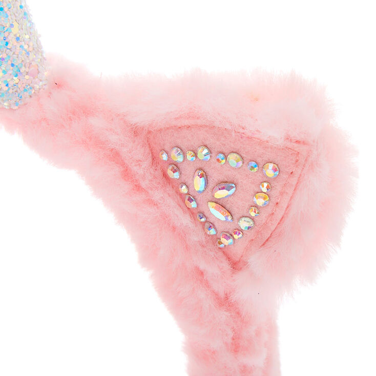 Cache-oreilles doux rose avec d&eacute;coration licorne,