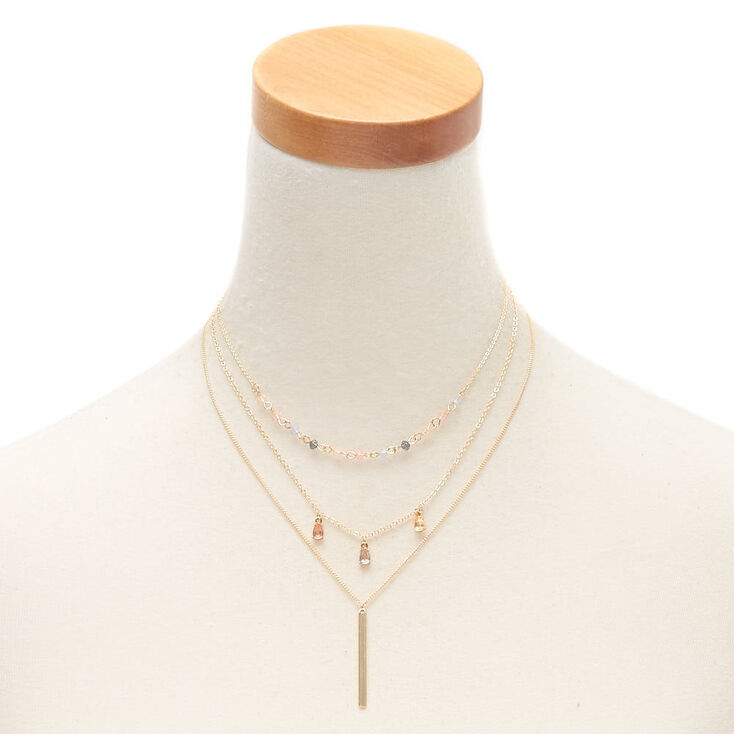 Claire's Ras-de-cou multi-rangs avec pierres et perles d'imitation couleur doré