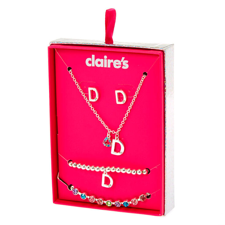 Claire's Coffret cadeau parure de bijoux à initiale D arc-en-ciel couleur argenté - Lot de 4