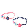 Bandeau avec boutons en forme de fleurs,
