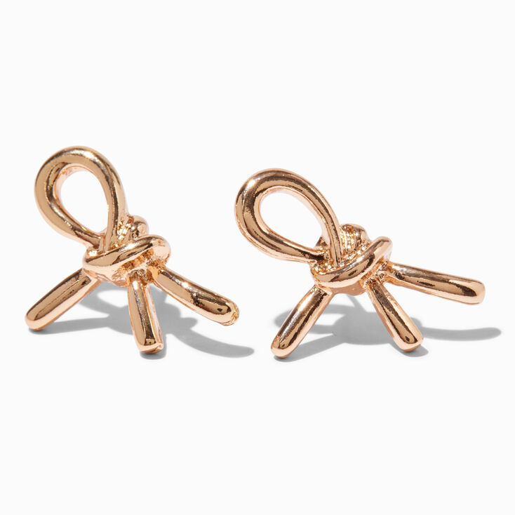 Clous d&#39;oreilles n&oelig;uds couleur dor&eacute;e,